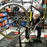 Wamsley working on a bike